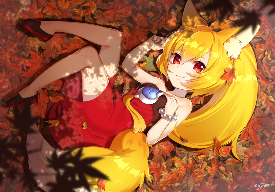 1girl animal_ears autumn_leaves bangs bare_shoulders bead_bracelet beads black_footwear blonde_hair bracelet dress fang fang_out fox_ears fox_tail from_above hair_between_eyes hand_on_own_chest jewelry looking_at_viewer lying miho_(monster_super_league) monster_super_league on_back ponytail red_dress red_eyes smile solo strapless strapless_dress tail ujou