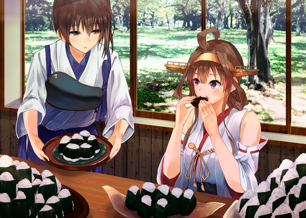 2girls ahoge bare_shoulders blue_skirt brown_eyes brown_hair commentary detached_sleeves double_bun eating food hakama_skirt headgear holding holding_food holding_tray indoors japanese_clothes kaga_(kantai_collection) kantai_collection kongou_(kantai_collection) konkito long_hair looking_at_another multiple_girls muneate nontraditional_miko onigiri remodel_(kantai_collection) side_ponytail sitting skirt table tasuki tray violet_eyes