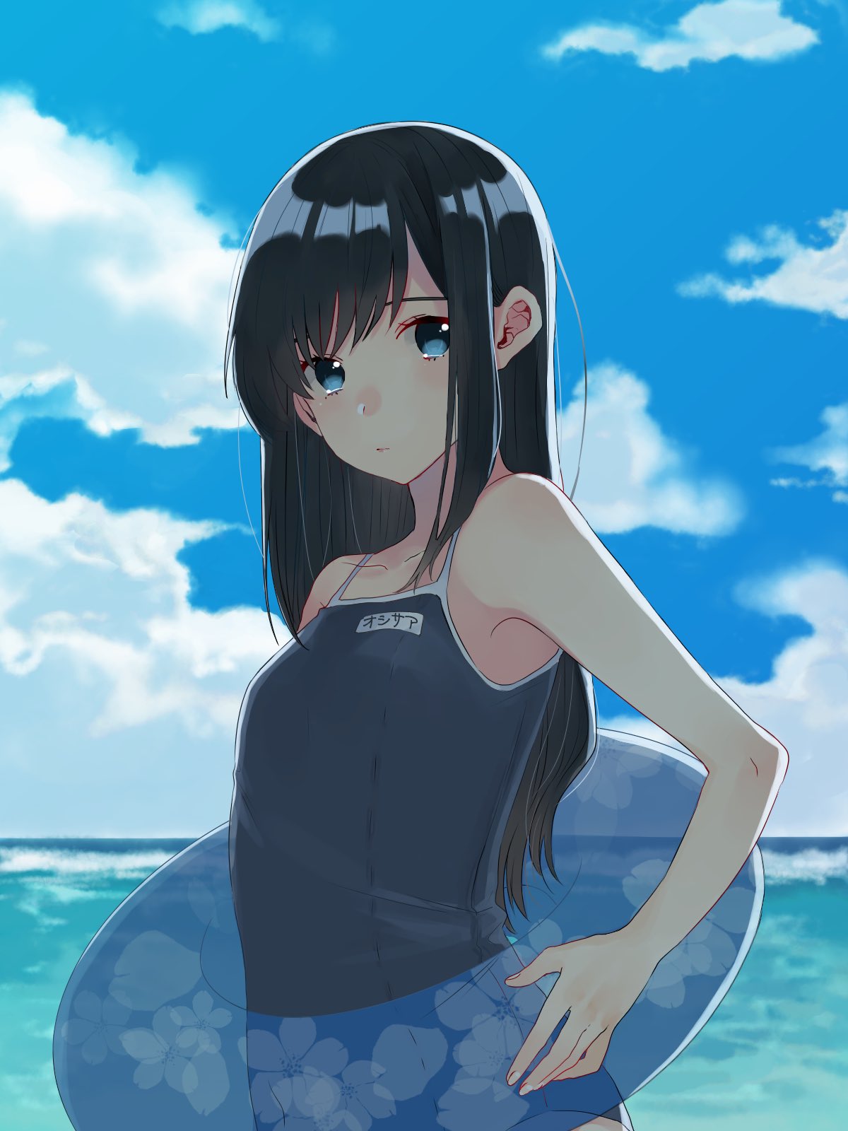 1girl asashio_(kantai_collection) black_hair blue_eyes blue_sky blue_swimsuit blurry clouds competition_school_swimsuit cowboy_shot day depth_of_field highres horizon imai_(tomori_kuro) innertube kantai_collection long_hair looking_at_viewer name_tag ocean outdoors school_swimsuit sky solo swimsuit water