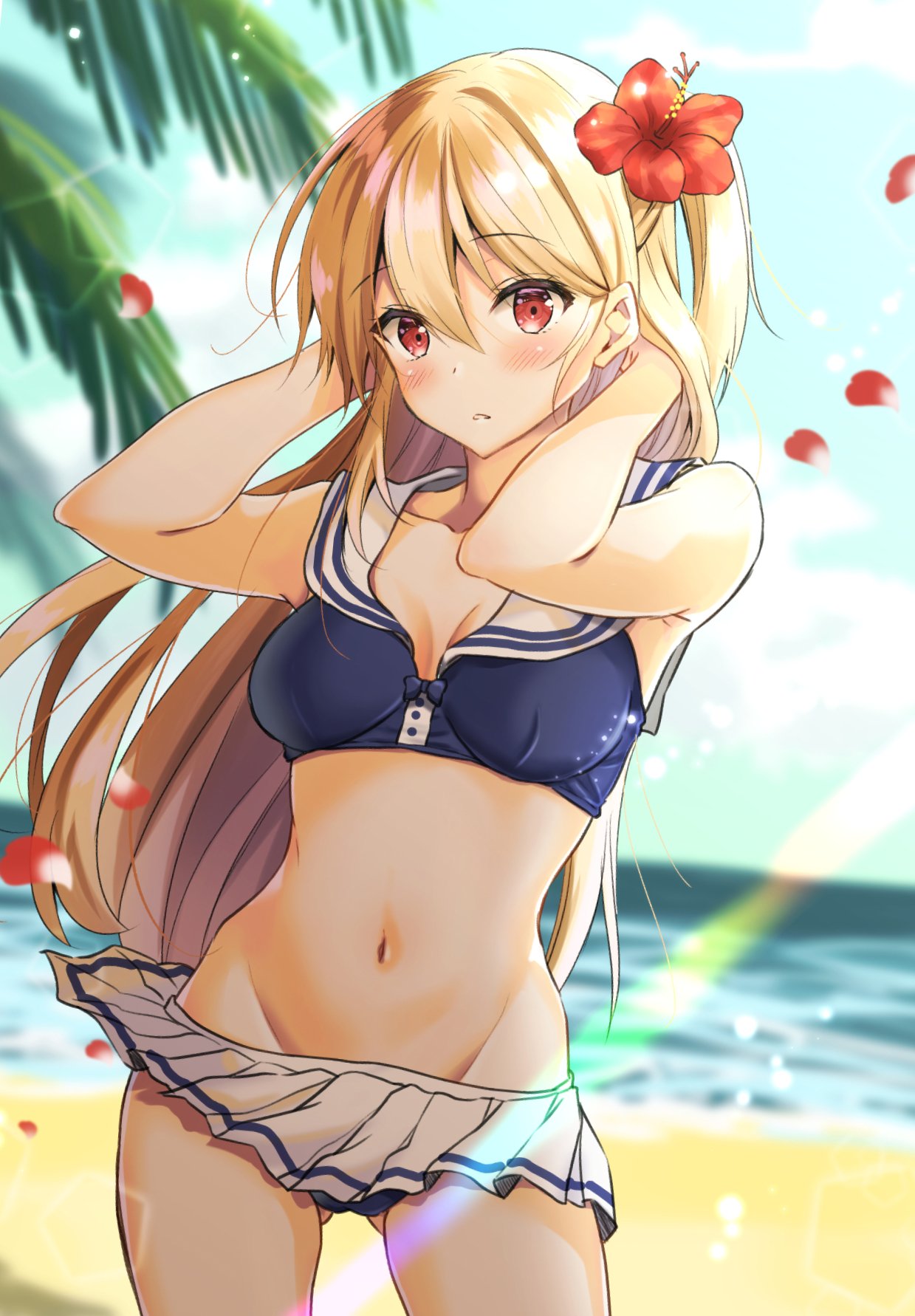 1girl azur_lane beach blonde_hair blush cleveland_(azur_lane) flower gluteal_fold hair_flower hair_ornament hands_in_hair highres long_hair midriff mii_no_suke navel palm_tree petals red_eyes sailor_bikini sailor_collar skirt tree