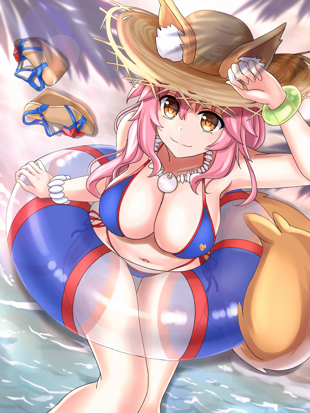 1girl animal_ears bikini blue_bikini breasts cleavage day ears_through_headwear fate/grand_order fate_(series) fox_ears fox_tail hat highres innertube large_breasts long_hair looking_at_viewer ocean outdoors pink_hair side-tie_bikini solo straw_hat swimsuit tail tamamo_(fate)_(all) tamamo_no_mae_(swimsuit_lancer)_(fate) xyomouse yellow_eyes