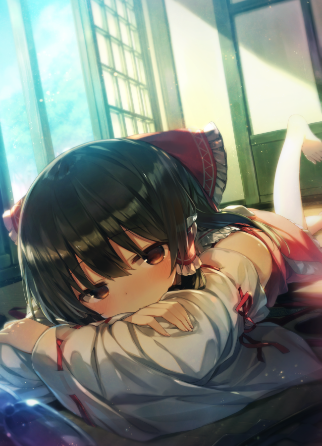 1girl bangs bare_shoulders barefoot black_hair blue_sky blush bottle bow brown_hair clouds commentary_request day detached_sleeves eyebrows_visible_through_hair feet_out_of_frame frilled_bow frilled_shirt_collar frills gohei hair_between_eyes hair_bow hair_tubes hakurei_reimu indoors leg_up light_particles long_sleeves looking_at_viewer lying on_stomach petticoat red_bow red_ribbon red_skirt ribbon ribbon-trimmed_sleeves ribbon_trim shinoba skirt sky sliding_doors solo tatami touhou wide_sleeves