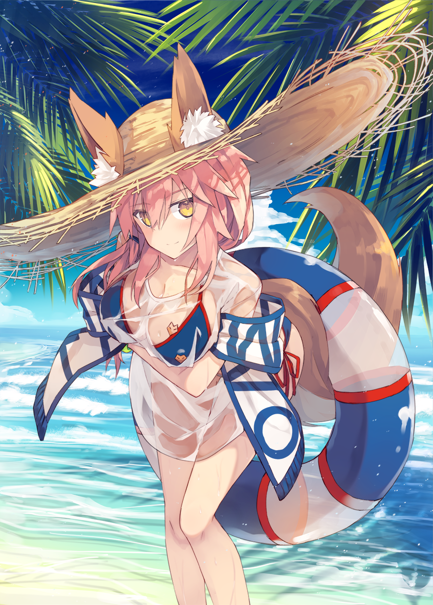 1girl animal_ears bangs beach bikini blush breasts clouds commentary_request fate/grand_order fate_(series) fox_ears fox_girl fox_tail hair_between_eyes hair_tie hat highres holding innertube large_breasts long_hair looking_at_viewer low_ponytail nagishiro_mito ocean outdoors palm_tree pink_hair see-through sidelocks sky solo standing straw_hat swimsuit tail tamamo_(fate)_(all) tamamo_no_mae_(swimsuit_lancer)_(fate) tree yellow_eyes