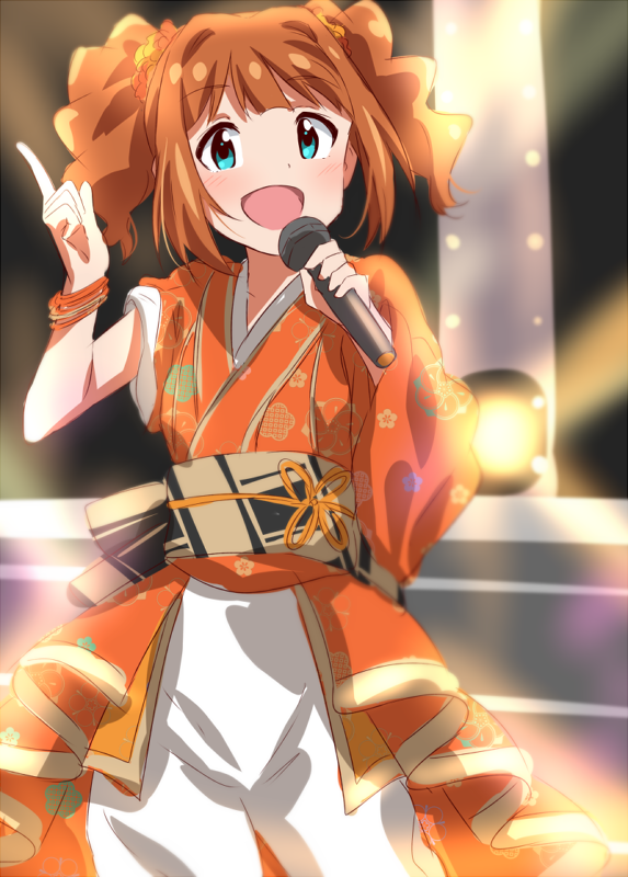 1girl :d asymmetrical_sleeves blue_eyes blurry blurry_background bracelet brown_hair cowboy_shot eyebrows_visible_through_hair floral_print hair_ornament holding holding_microphone idol idolmaster idolmaster_(classic) index_finger_raised japanese_clothes jewelry kimono lieass long_hair microphone open_mouth orange_kimono pants print_kimono shiny shiny_hair smile solo stage standing takatsuki_yayoi twintails white_pants