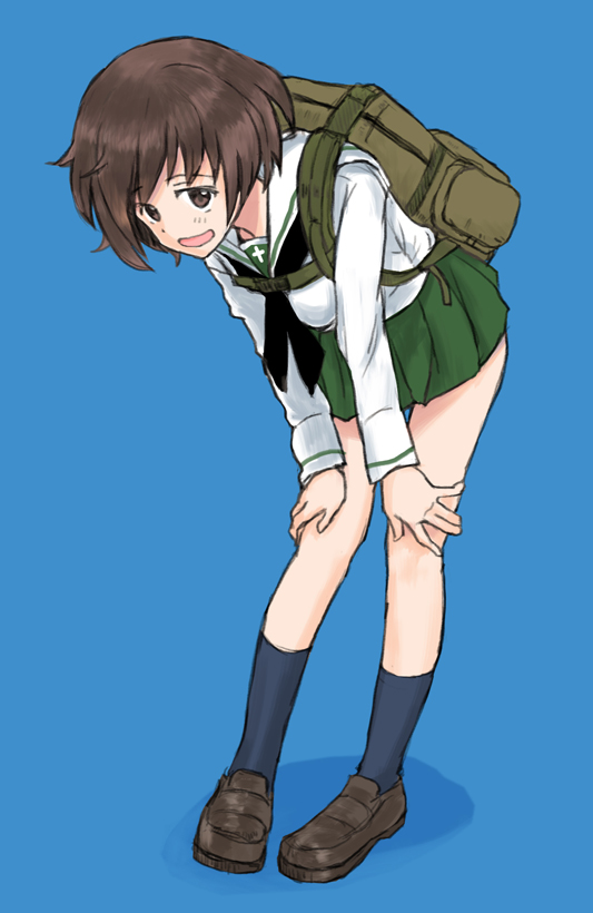 1girl akiyama_yukari backpack bag bangs black_legwear black_neckwear blouse blue_background brown_eyes brown_footwear brown_hair closed_mouth full_body girls_und_panzer green_skirt hands_on_thighs leaning_forward loafers long_sleeves looking_at_viewer messy_hair miniskirt mutsu_(layergreen) neckerchief ooarai_school_uniform open_mouth pleated_skirt school_uniform serafuku shadow shoes short_hair simple_background skirt smile socks solo standing white_blouse