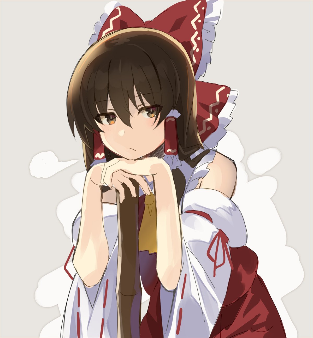 1girl ascot bangs bare_shoulders blush bow broom brown_eyes brown_hair commentary_request cowboy_shot detached_sleeves eyebrows_visible_through_hair frilled_bow frilled_shirt_collar frills grey_background hair_between_eyes hair_bow hair_tubes hakurei_reimu hand_rest highres long_hair long_sleeves looking_at_viewer red_bow red_skirt rin_falcon sidelocks simple_background skirt skirt_set solo touhou wide_sleeves yellow_neckwear