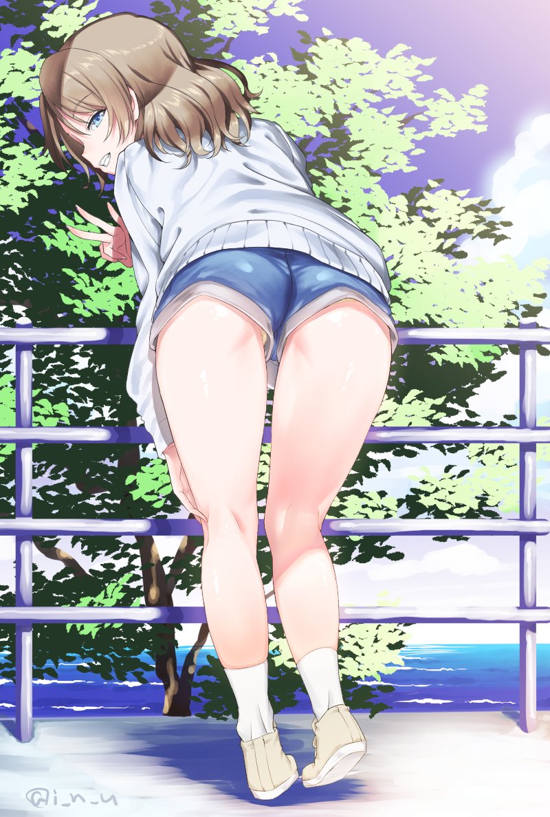 1girl ass bangs blue_eyes blue_shorts blue_sky brown_hair clouds cloudy_sky commentary eyebrows_visible_through_hair from_behind full_body grin half-closed_eyes hand_on_own_leg heel_up inu_(aerodog) kneepits leaning_forward legs long_sleeves looking_at_viewer looking_back love_live! love_live!_sunshine!! medium_hair ocean outdoors panties panty_peek railing shoes short_shorts shorts sky smile socks solo standing sweater thighs tree twitter_username underwear upshorts w watanabe_you white_footwear white_legwear white_sweater yellow_panties