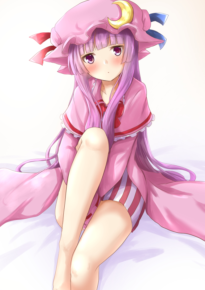 1girl bangs barefoot bed blue_ribbon blunt_bangs blush bow bowtie capelet commentary_request crescent crescent_moon_pin eyebrows_visible_through_hair hat hat_ribbon long_hair looking_at_viewer on_bed patchouli_knowledge ram_hachimin red_bow red_neckwear red_ribbon ribbon simple_background sitting sitting_on_bed solo thighs touhou very_long_hair violet_eyes