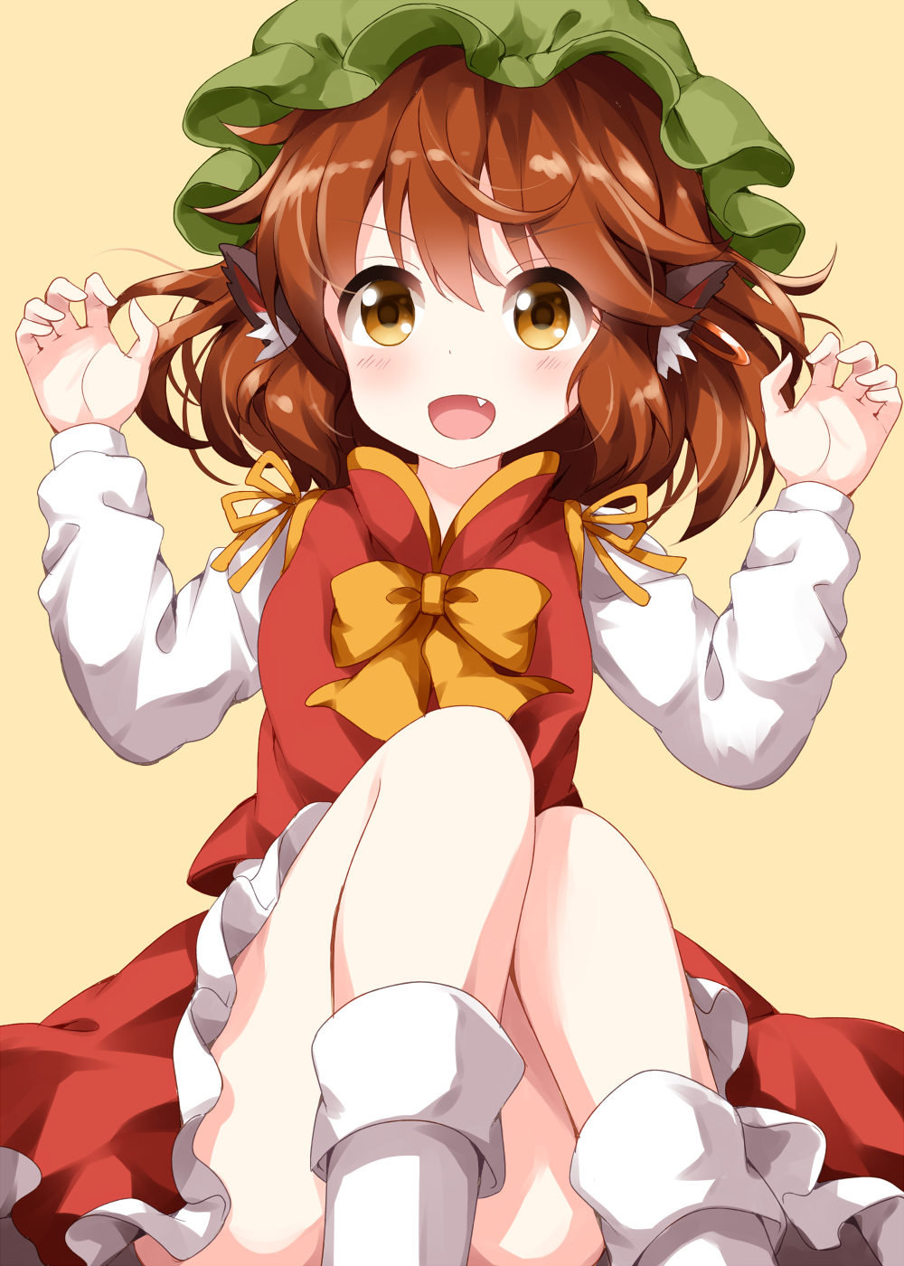 1girl animal_ear_fluff animal_ears ass bangs blush bow bowtie brown_hair cat_ears chen claw_pose commentary_request convenient_leg earrings eyebrows_visible_through_hair fang feet_out_of_frame green_hat hair_between_eyes hands_up hat highres jewelry knees_up mob_cap open_mouth petticoat red_skirt red_vest ribbon ruu_(tksymkw) shirt simple_background sitting skirt skirt_set smile socks solo thighs touhou vest white_legwear white_shirt yellow_background yellow_bow yellow_eyes yellow_neckwear yellow_ribbon