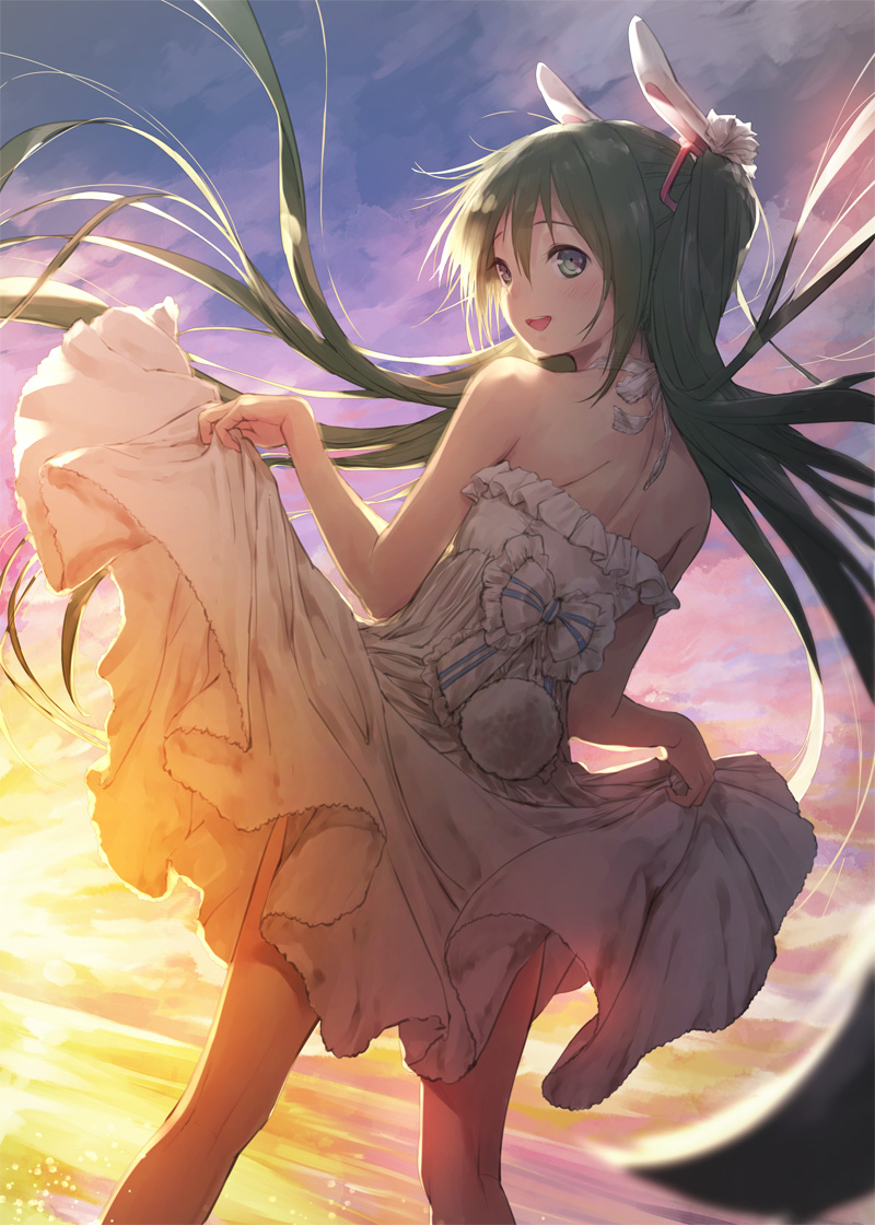 1girl animal_ears blush bow bunny_tail clouds cloudy_sky commentary_request cowboy_shot dress dress_lift ek_masato frills from_behind green_eyes green_hair hair_ornament hatsune_miku long_hair looking_back ocean rabbit_ears sky sleeveless sleeveless_dress smile solo sunrise tail twintails very_long_hair vocaloid white_dress