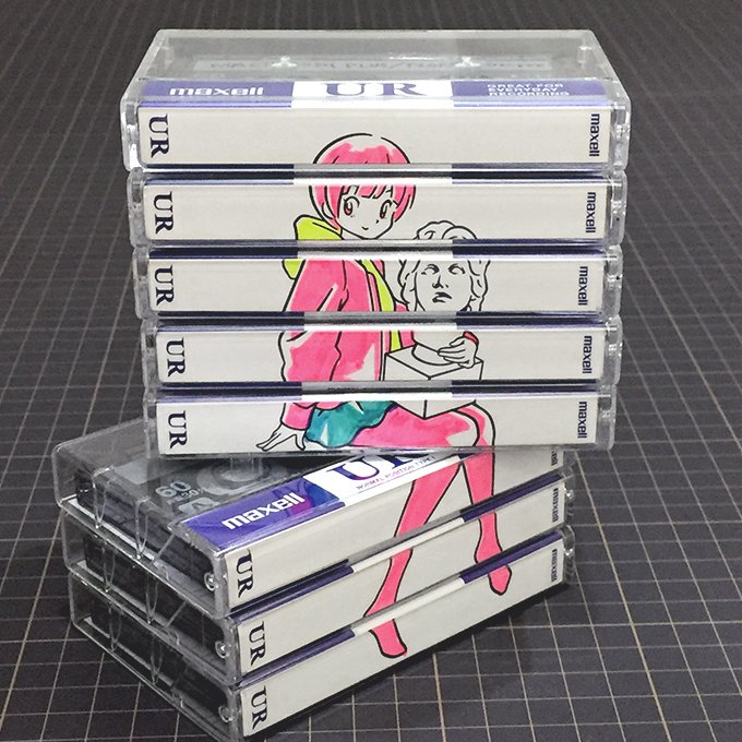 1girl bust_(sculpture) cassette_tape commentary_request holding hood hood_down hoodie long_sleeves original panasonynet pantyhose photo pink_eyes pink_hair pink_legwear short_hair sitting skirt smile solo stack unconventional_media