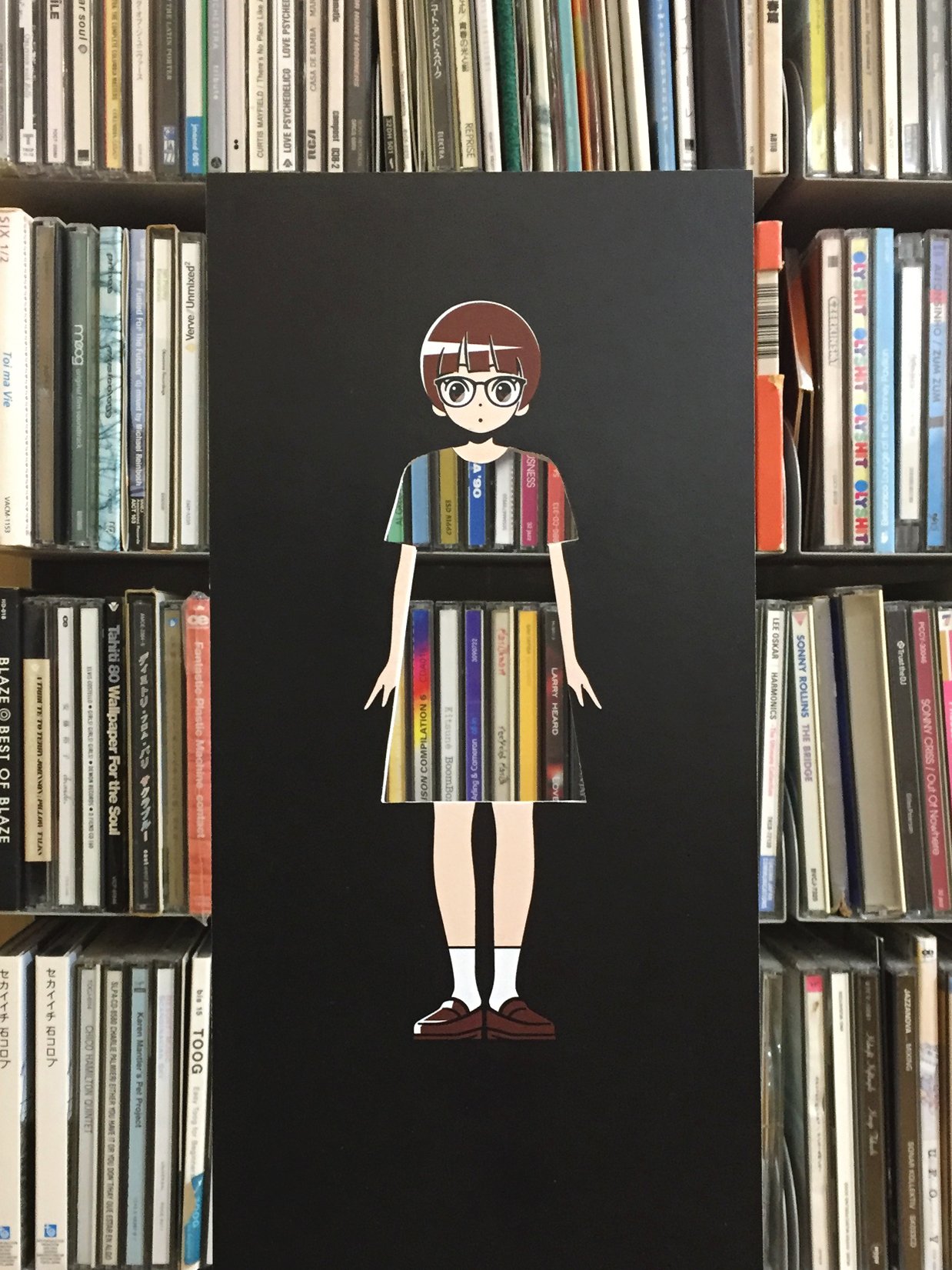 1girl arms_at_sides bangs blunt_bangs brown_footwear brown_hair cd_case dress english_text full_body glasses highres looking_at_viewer original panasonynet patterned_clothing photo shelf shoes short_hair socks solo standing unconventional_media white_legwear