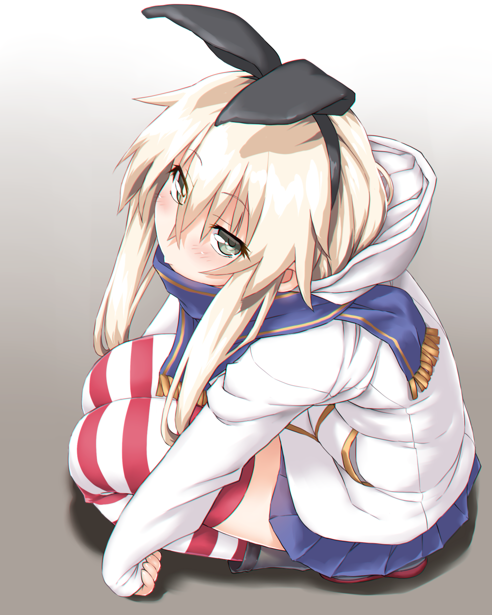 1girl blonde_hair blue_skirt blush dd_(ijigendd) grey_eyes highres hood hood_down hoodie kantai_collection long_hair looking_at_viewer looking_up microskirt shimakaze_(kantai_collection) skirt solo squatting striped striped_legwear thigh-highs