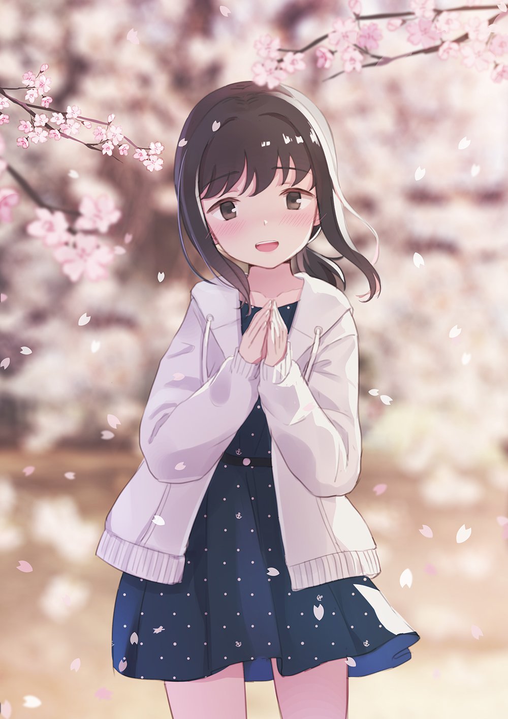 1girl :d anchor_symbol bangs blue_dress blurry blush brown_eyes brown_hair cherry_blossoms commentary_request cowboy_shot day depth_of_field dress emia_wang eyebrows_visible_through_hair flower fubuki_(kantai_collection) highres jacket kantai_collection long_hair long_sleeves looking_at_viewer open_mouth outdoors own_hands_together petals polka_dot polka_dot_dress short_ponytail sidelocks smile solo standing tree_branch white_jacket wind