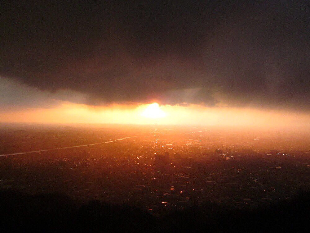 banishment building city cityscape clouds cloudy_sky commentary_request no_humans original scenery sky sun sunset