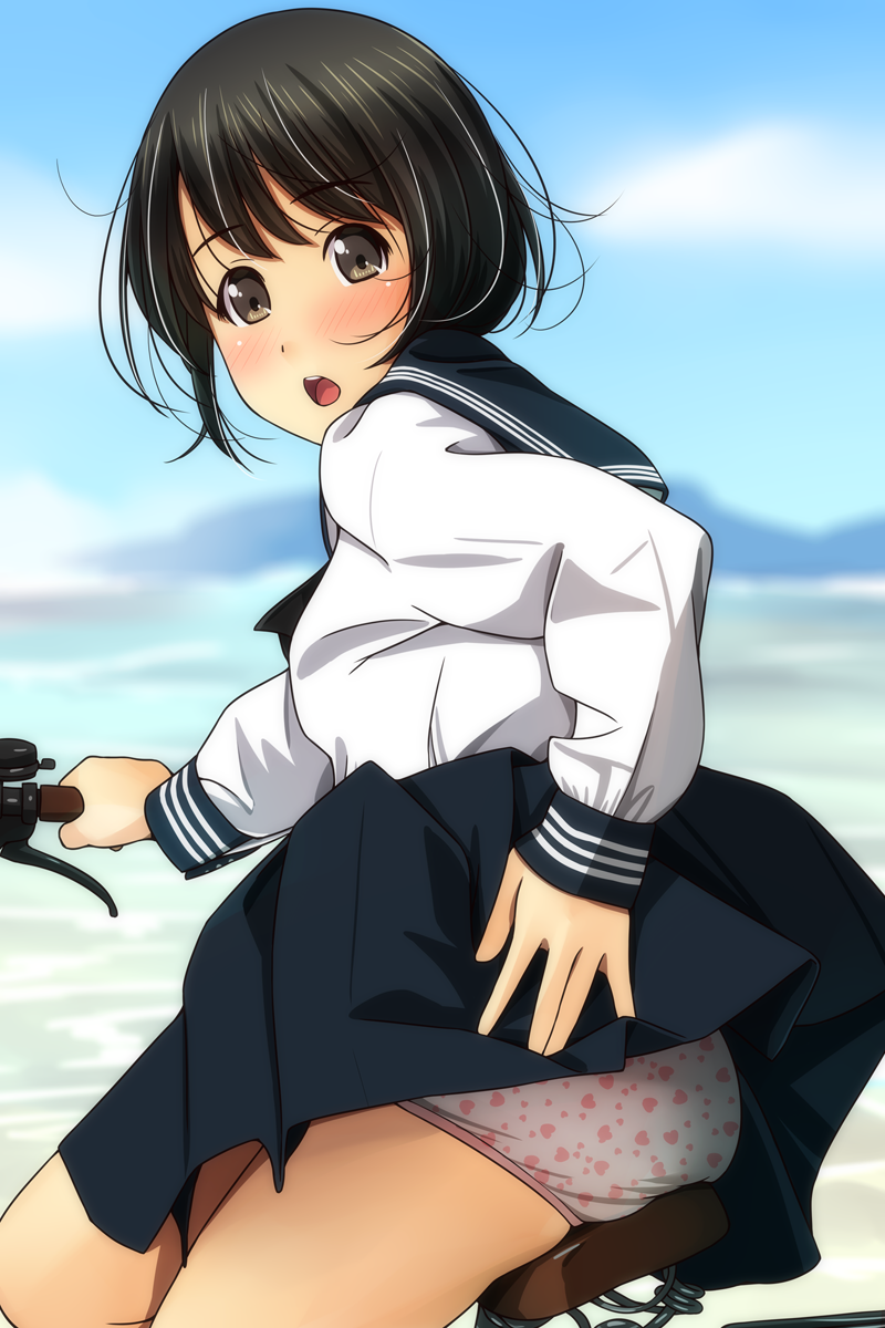 1girl :o bangs bicycle black_hair black_sailor_collar black_skirt blue_sky blurry blurry_background blush brown_eyes clouds commentary_request day depth_of_field eyebrows_visible_through_hair ground_vehicle heart heart_panties heart_print highres long_sleeves looking_at_viewer looking_to_the_side matsunaga_kouyou open_mouth original outdoors panties pleated_skirt print_panties sailor_collar shirt skirt skirt_lift sky sleeves_past_wrists solo underwear white_panties white_shirt wind wind_lift