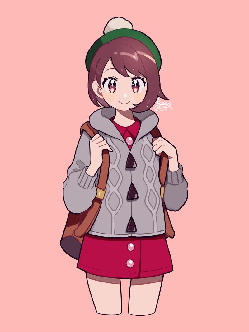 1girl backpack bag bangs brown_eyes brown_hair cardigan cowboy_shot creatures_(company) cropped_legs female_protagonist_(pokemon_swsh) game_freak green_hat hat kisaragi_yuu_(fallen_sky) long_sleeves looking_at_viewer nintendo pink_background pokemon pokemon_(game) pokemon_swsh red_shirt shirt short_hair signature simple_background smile solo tam_o'_shanter