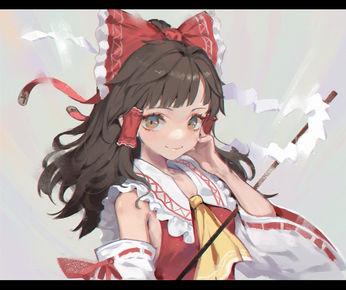 1girl arm_ribbon ascot bangs bare_shoulders black_hair bow brown_eyes chinese_commentary commentary_request detached_sleeves frilled_bow frilled_shirt_collar frills gohei grey_background hair_bow hair_tubes hakurei_reimu half_updo hand_on_own_cheek hand_up letterboxed long_hair long_sleeves looking_at_viewer megisa red_bow ribbon ribbon-trimmed_sleeves ribbon_trim shide sidelocks smile solo touhou upper_body wide_sleeves yellow_neckwear