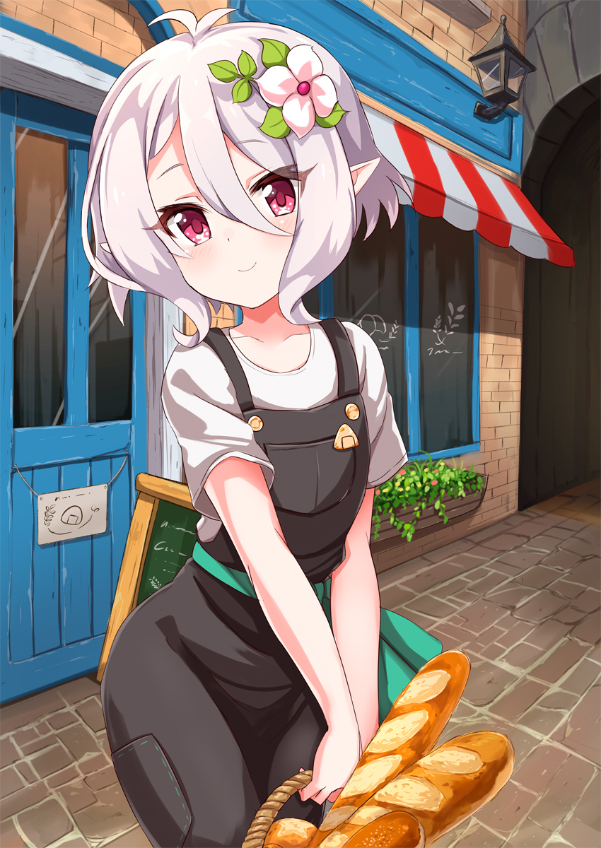 1girl ame. antenna_hair baguette bangs basket blush bread brick_wall closed_mouth collared_shirt commentary_request day door eyebrows_visible_through_hair flower food hair_between_eyes hair_flower hair_ornament head_tilt highres holding holding_basket kokkoro_(princess_connect!) outdoors overalls pointy_ears princess_connect! princess_connect!_re:dive red_eyes shirt short_sleeves silver_hair smile solo storefront wall_lamp white_flower white_shirt window
