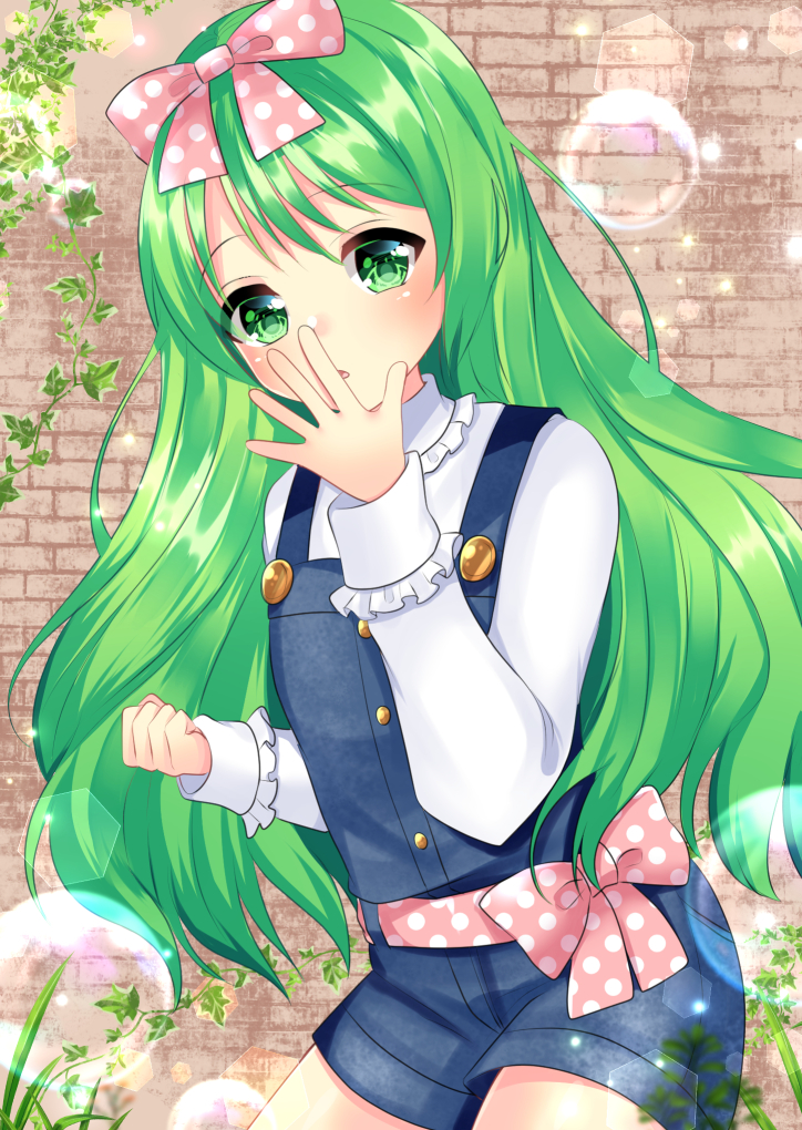 1girl bangs blush bow brick_wall clenched_hand collared_shirt commentary_request cowboy_shot eyebrows_visible_through_hair frilled_shirt_collar frilled_sleeves frills green_eyes green_hair hair_bow hand_to_own_mouth hand_up long_hair long_sleeves misaki_(misaki86) original overall_shorts parted_lips pink_bow polka_dot polka_dot_bow shirt solo very_long_hair white_shirt