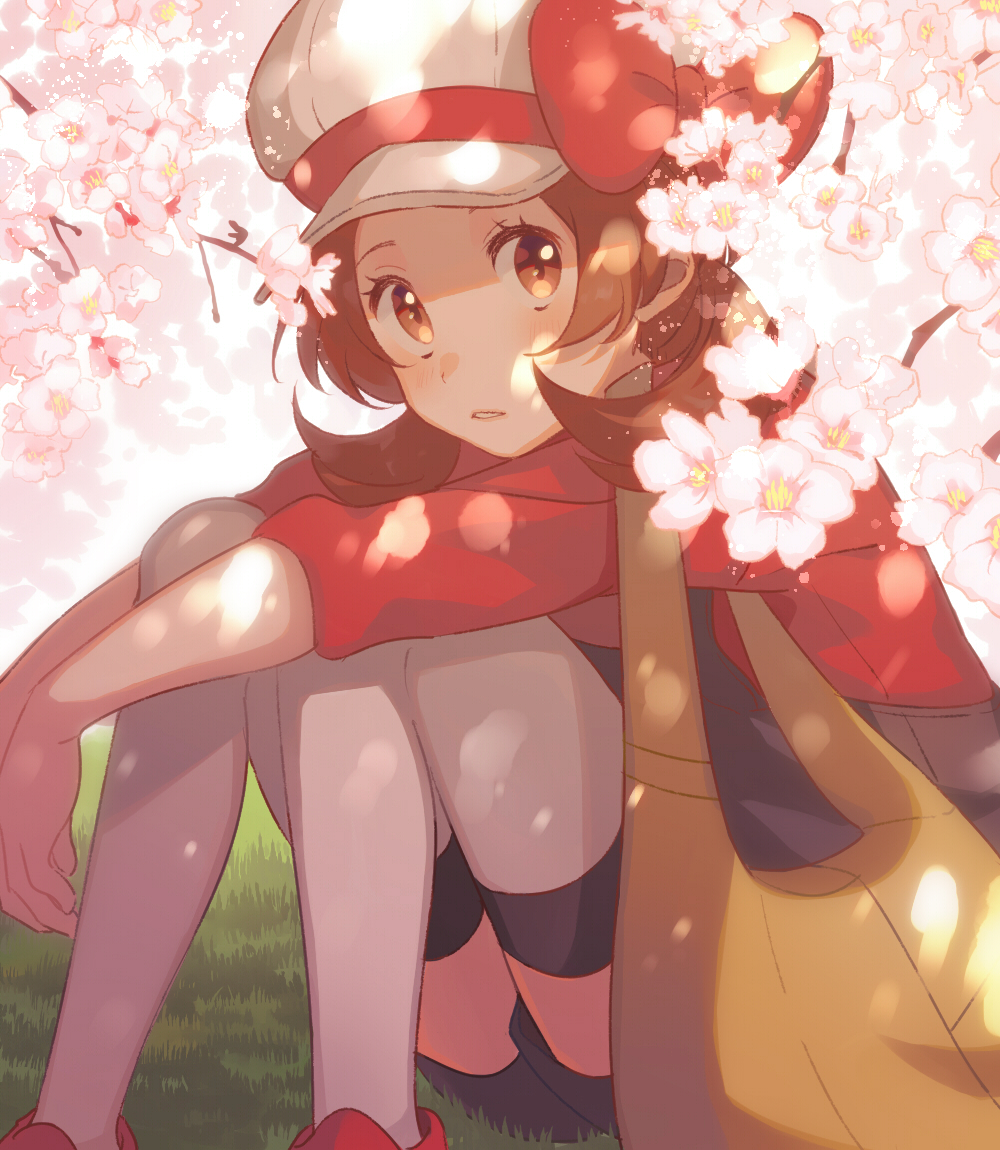 1girl bag blush bow brown_eyes brown_hair cherry_blossoms flower grass hat hat_bow knees_up kotone_(pokemon) light_blush long_sleeves looking_at_viewer outdoors outstretched_arms overalls parted_lips pokemon pokemon_(game) pokemon_hgss red_bow red_footwear red_shirt shirt shoes short_hair sitting solo teeth thigh-highs tree unapoppo white_flower white_headwear white_legwear