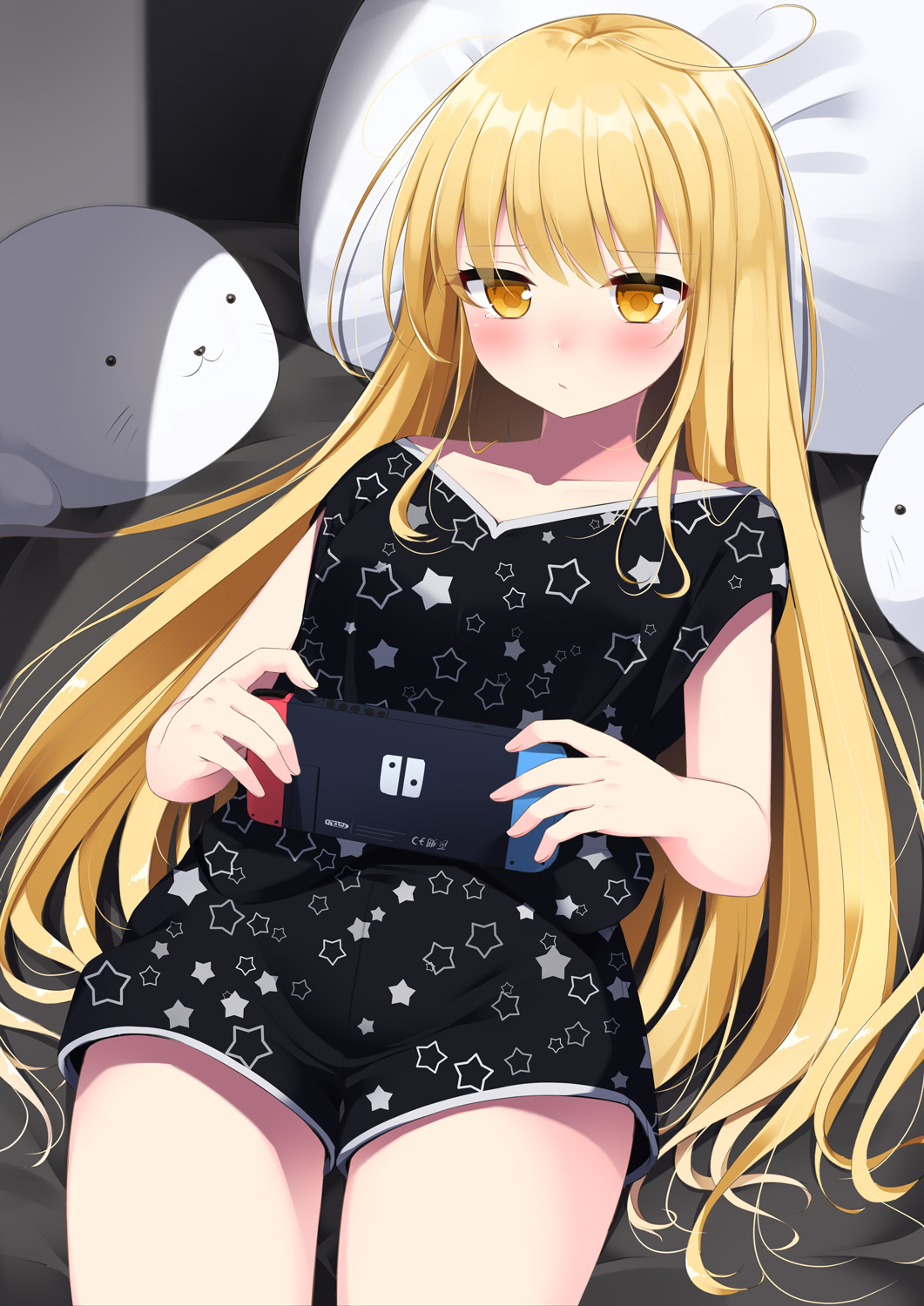 1girl ahoge black_shirt black_shorts blonde_hair closed_mouth collarbone commentary_request game_console highres holding long_hair looking_at_viewer loungewear lying nintendo_switch on_back on_bed original pillow sasahara_wakaba shirt short_shorts shorts solo star star_print thighs very_long_hair yellow_eyes