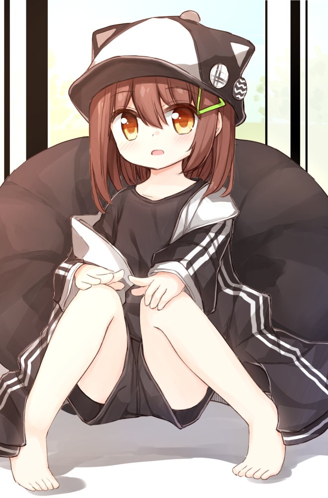 1girl animal_ears animal_hat badge bangs barefoot baseball_cap black_headwear black_jacket black_shirt black_shorts blush brown_eyes brown_hair button_badge commentary_request eyebrows_visible_through_hair fake_animal_ears hair_between_eyes hair_ornament hands_on_own_knees hat jacket knees_together_feet_apart long_sleeves looking_at_viewer off_shoulder open_clothes open_jacket original shirt short_shorts shorts sitting sleeves_past_wrists solo yuuhagi_(amaretto-no-natsu)