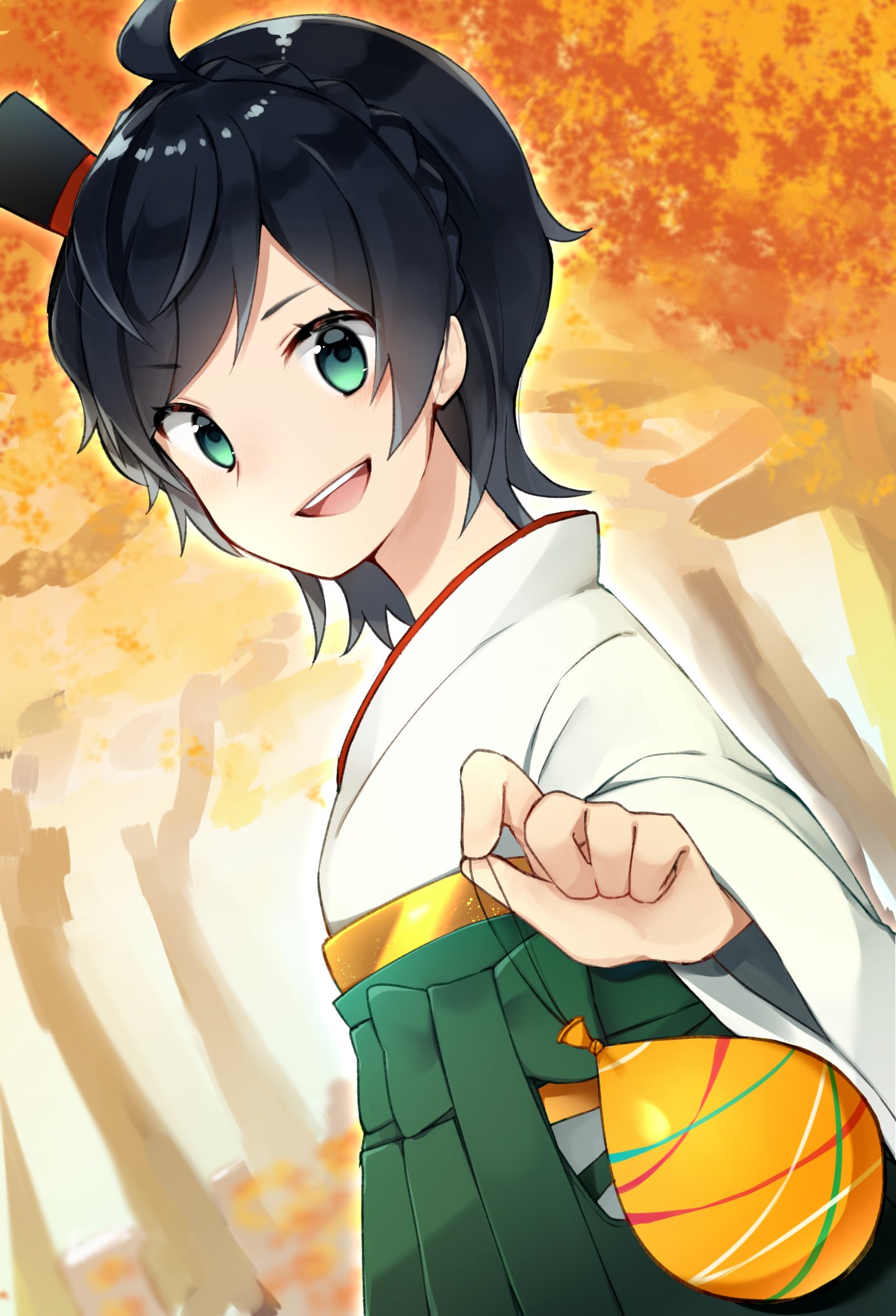 1girl ahoge autumn bangs black_hair day eyebrows_visible_through_hair furisode green_eyes green_hakama hakama hat highres holding japanese_clothes kantai_collection katsuobushi_(eba_games) kimono matsukaze_(kantai_collection) meiji_schoolgirl_uniform mini_hat mini_top_hat open_mouth outdoors short_hair solo top_hat tree water_balloon wide_sleeves