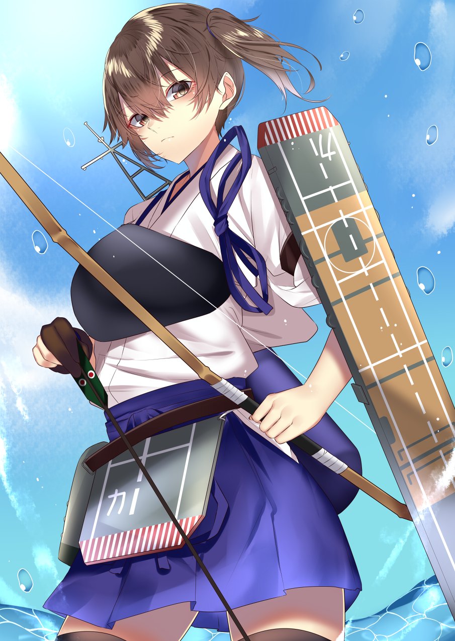 1girl black_legwear blue_hakama bow_(weapon) brown_eyes brown_hair eyebrows_visible_through_hair flight_deck gloves hair_between_eyes hakama hakama_skirt highres holding holding_bow_(weapon) holding_weapon japanese_clothes kaga_(kantai_collection) kantai_collection muneate ocean onineko-chan partly_fingerless_gloves short_hair side_ponytail solo tasuki thigh-highs weapon yugake yumi_(bow)