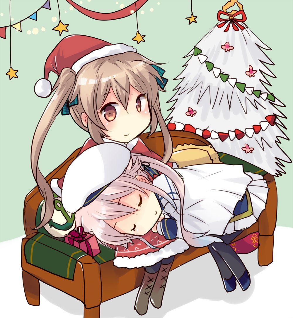 2girls alternate_costume anchor_symbol beret blonde_hair box christmas_tree cloak closed_eyes commentary_request couch eyebrows_visible_through_hair fur_trim gift gift_box hair_between_eyes hair_ribbon harusame_(kantai_collection) hat hirune_(konekonelkk) kantai_collection lap_pillow long_hair looking_at_viewer multiple_girls murasame_(kantai_collection) orange_eyes pantyhose pink_hair ribbon santa_hat side_ponytail simple_background sitting smile twintails white_cloak