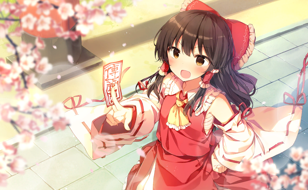 1girl ascot bangs bare_shoulders black_hair blush bow brown_eyes cherry_blossoms commentary_request cowboy_shot detached_sleeves eyebrows_visible_through_hair frilled_bow frilled_shirt_collar frills hakurei_reimu hand_on_hip holding lens_flare long_hair long_sleeves looking_at_viewer ofuda open_mouth outdoors red_bow red_skirt ribbon-trimmed_sleeves ribbon_trim sarashi shadow shinoba sidelocks skirt solo standing touhou touhou_cannonball wide_sleeves yellow_neckwear