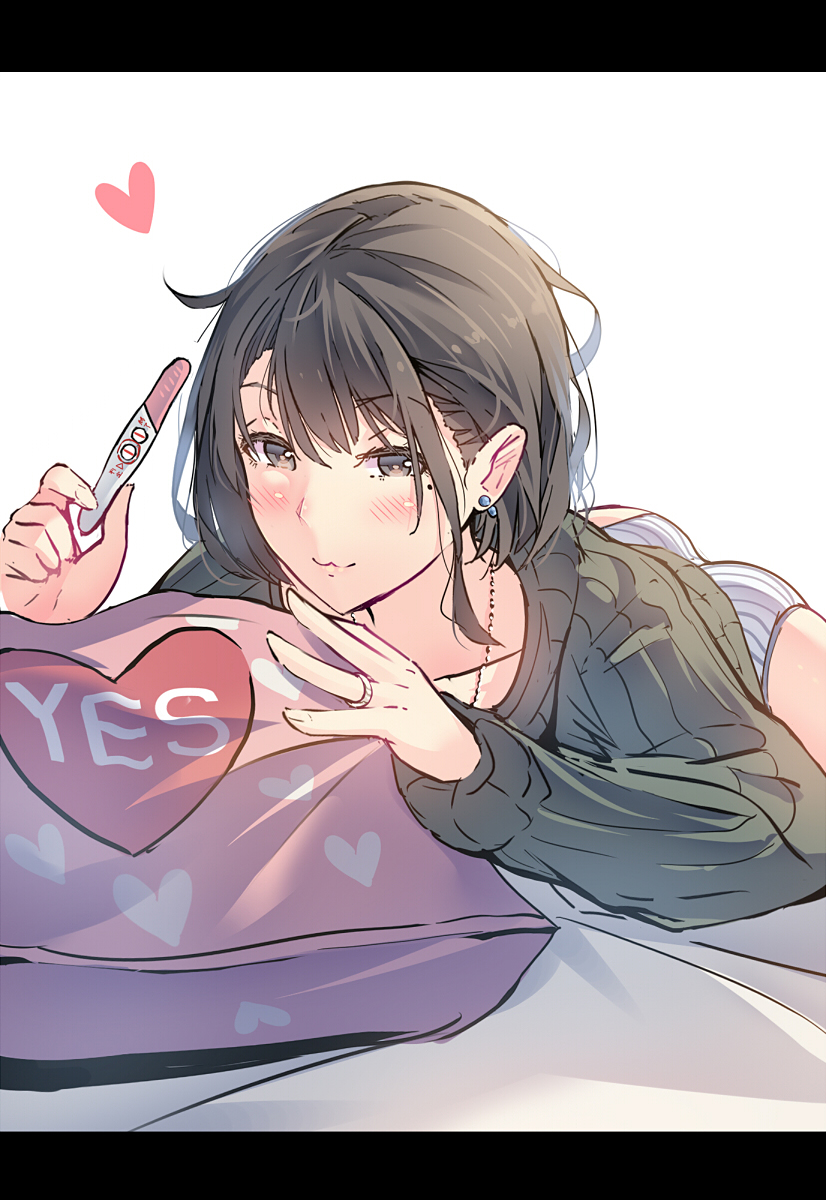 1girl :3 bangs blush brown_eyes brown_hair daito earrings eyebrows_visible_through_hair heart highres jewelry letterboxed looking_at_viewer lying messy_hair on_bed on_stomach original pregnancy_test ring solo wedding_band yes-no_pillow