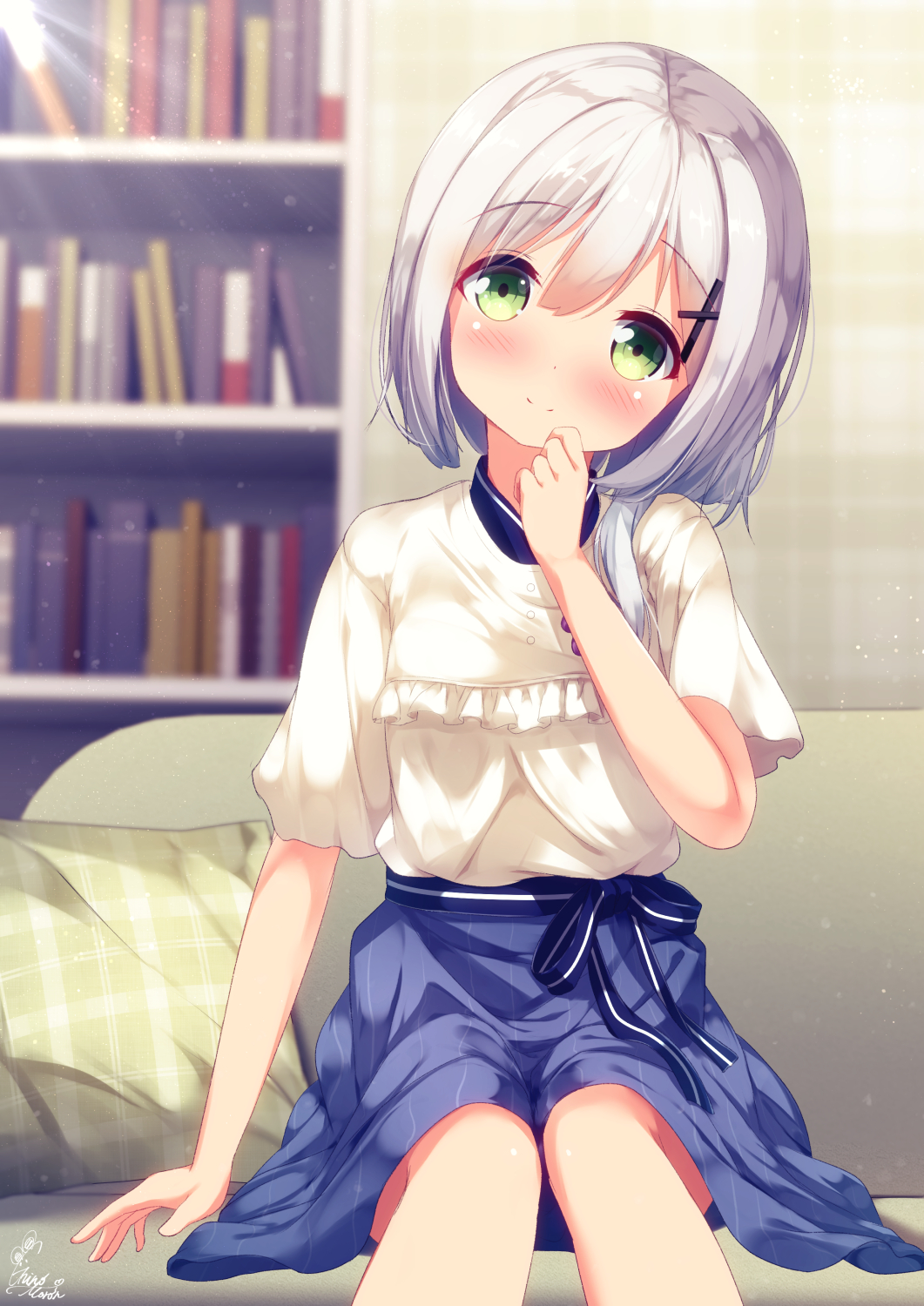 1girl backlighting bangs blue_skirt blurry blurry_background blush book bookshelf chinomaron closed_mouth commentary_request couch depth_of_field eyebrows_visible_through_hair green_eyes hair_between_eyes hair_ornament hairclip head_tilt highres kazami_yuika long_hair on_couch plaid_pillow shirt short_sleeves signature silver_hair sitting skirt smile solo sunlight virtual_youtuber white_shirt yuika's_room