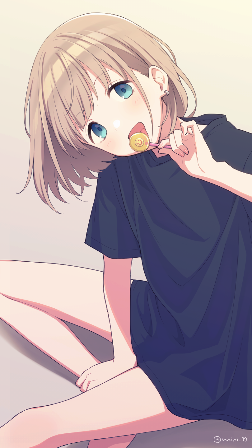 1girl agata_(agatha) bare_legs barefoot black_shirt blue_eyes brown_background candy commentary_request earrings food head_tilt highres idolmaster jewelry light_brown_hair lollipop looking_at_viewer open_mouth oversized_clothes serizawa_asahi shirt short_hair short_sleeves sitting solo t-shirt