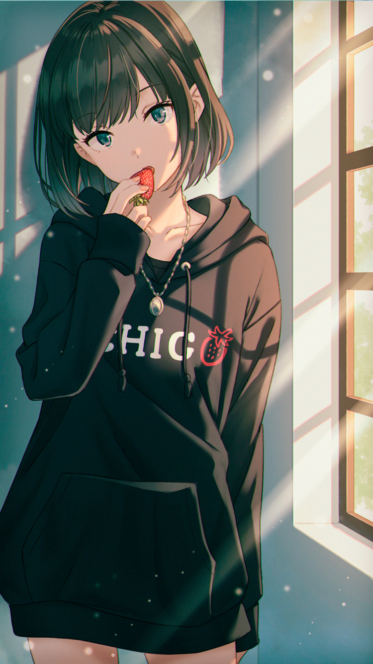 1girl black_hair black_hoodie blue_eyes clothes_writing collarbone cowboy_shot drawstring food fruit hand_up head_tilt highres holding holding_food holding_fruit hood hood_down hoodie_dress hyuuga_azuri jewelry light_rays long_sleeves looking_at_viewer necklace open_mouth original short_hair solo standing strawberry sunbeam sunlight window window_shade