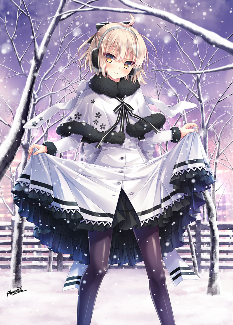 1girl ahoge bangs bare_tree black_legwear blonde_hair blush capelet commentary_request dress earmuffs eyebrows_visible_through_hair fate/grand_order fate_(series) ikegami_akane long_sleeves looking_at_viewer okita_souji_(fate) okita_souji_(fate)_(all) outdoors pantyhose ribbon short_hair signature skirt_hold smile snow snowing solo standing tree winter yellow_eyes