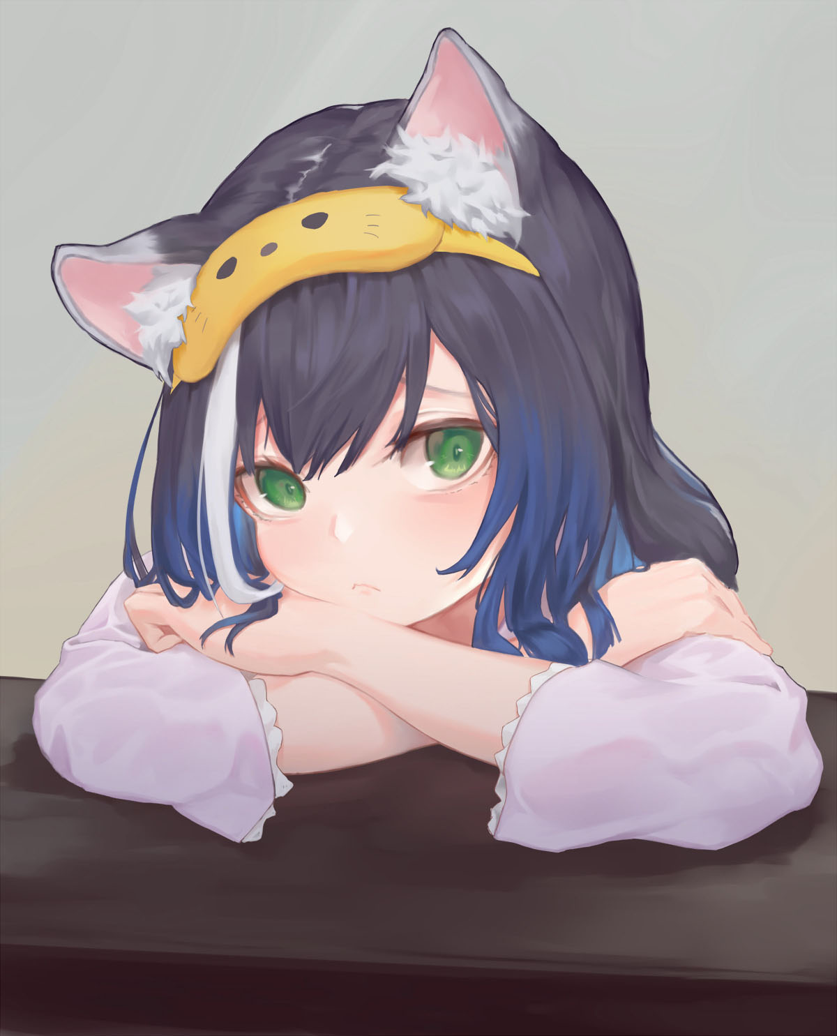 1girl animal_ear_fluff animal_ears bangs black_hair blue_hair blush cat_ears cat_girl closed_mouth gradient_hair green_eyes grey_background head_rest highres kyaru_(princess_connect) long_hair long_sleeves looking_at_viewer multicolored_hair princess_connect! princess_connect!_re:dive shou_xun_bu_liang simple_background sleep_mask solo streaked_hair table upper_body white_hair