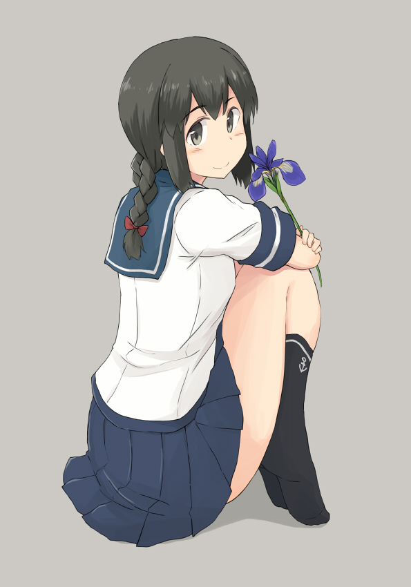 1girl black_eyes black_hair black_legwear blue_sailor_collar blue_skirt braid flower flower_request from_behind full_body grey_background hair_between_eyes isonami_(kantai_collection) kantai_collection kneehighs kugui_kiyunemu long_hair looking_at_viewer looking_back low_twintails pleated_skirt purple_flower sailor_collar school_uniform serafuku short_sleeves sidelocks simple_background sitting skirt solo twin_braids twintails