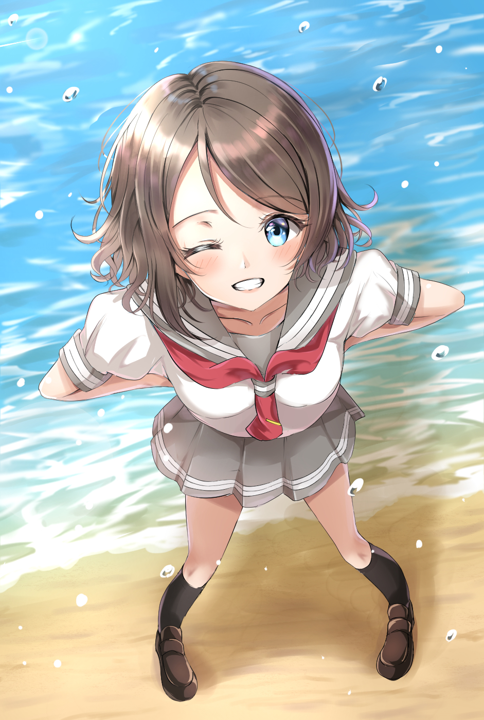 1girl :d ;d bangs beach black_legwear blue_eyes blush brown_footwear collarbone eyebrows_visible_through_hair from_above grey_hair grey_skirt hand_on_hip highres kneehighs looking_at_viewer looking_up love_live! love_live!_sunshine!! mary_janes neckerchief ocean one_eye_closed open_mouth outdoors pleated_skirt red_neckwear sailor_collar sand school_uniform shoes short_hair short_sleeves sin_(sin52y) skirt smile solo standing tie_clip uniform watanabe_you water water_drop