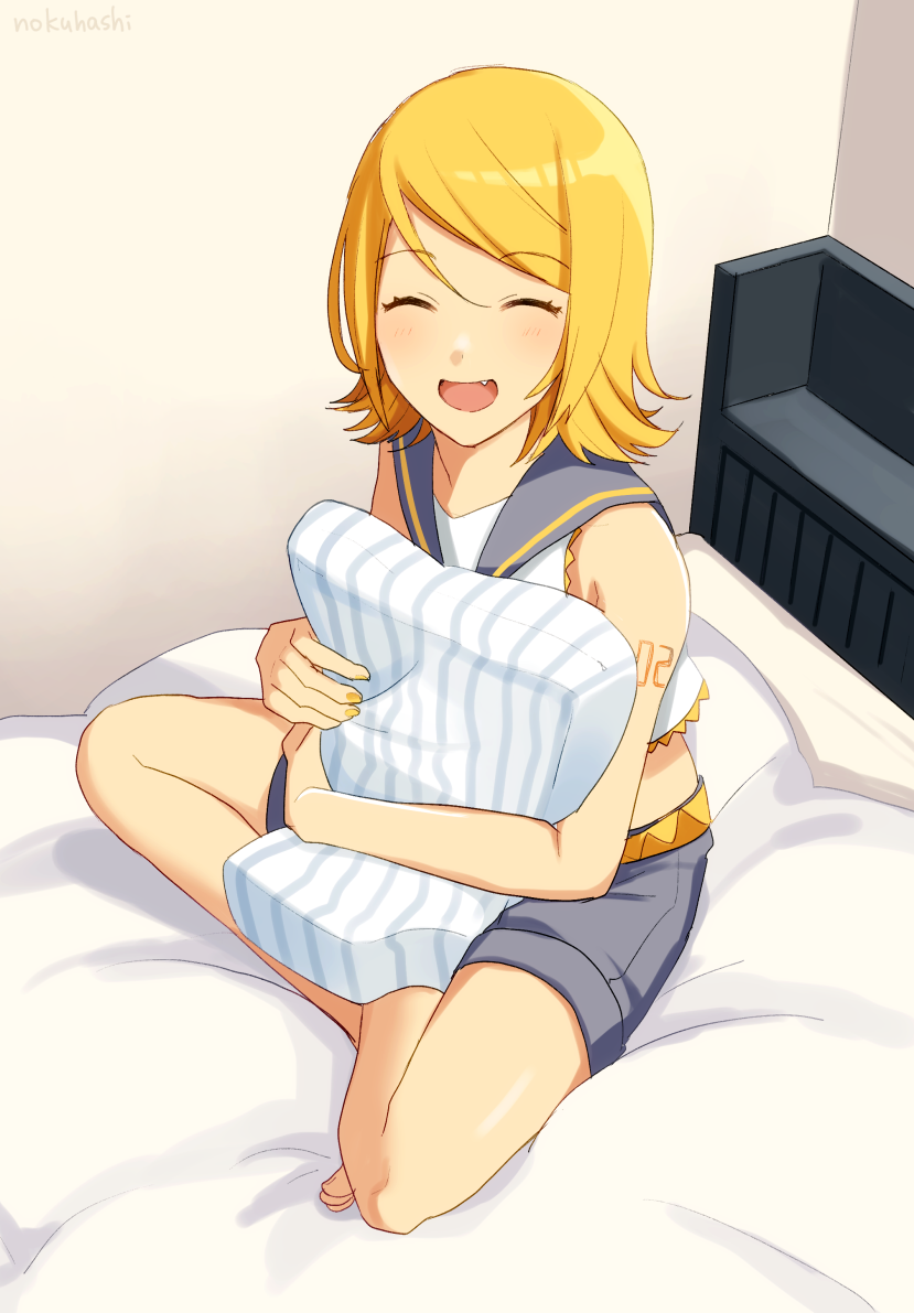 1girl bangs bare_shoulders barefoot bed belt blonde_hair closed_eyes collar commentary crop_top crossed_legs facing_viewer fang grey_collar grey_shorts indian_style kagamine_rin nail_polish nokuhashi open_mouth pillow sailor_collar shirt short_hair short_shorts shorts shoulder_tattoo sitting sleeveless sleeveless_shirt smile solo striped_pillow swept_bangs tattoo vocaloid white_shirt yellow_nails