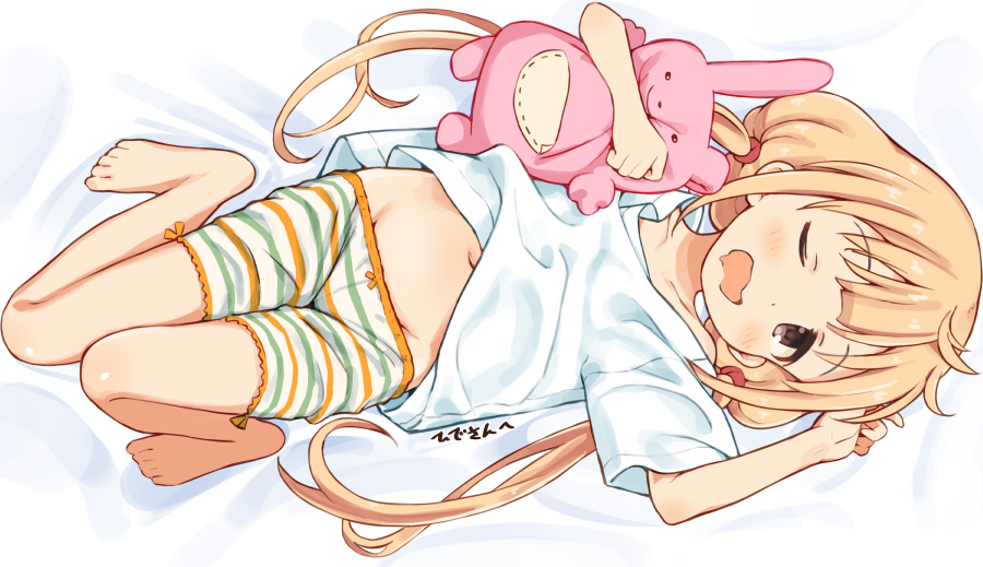 1girl bed_sheet blonde_hair brown_eyes collarbone commentary_request futaba_anzu holding holding_stuffed_animal idolmaster idolmaster_cinderella_girls long_hair looking_at_viewer low_twintails lying mirakichi on_back one_eye_closed open_mouth short_sleeves shorts solo striped striped_shorts stuffed_animal stuffed_bunny stuffed_toy twintails yawning