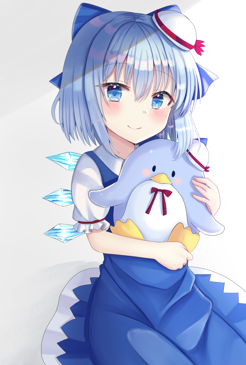 1girl bird blue_dress blue_hair blush cirno commentary_request cropped_legs doll dress eyebrows_visible_through_hair gradient gradient_background grey_background hair_between_eyes hair_ribbon hat holding holding_doll looking_at_viewer mini_hat nibosi penguin pinafore_dress puffy_short_sleeves puffy_sleeves ribbon sanrio shirt short_hair short_sleeves simple_background sitting smile solo touhou tuxedo_sam white_background white_shirt wings