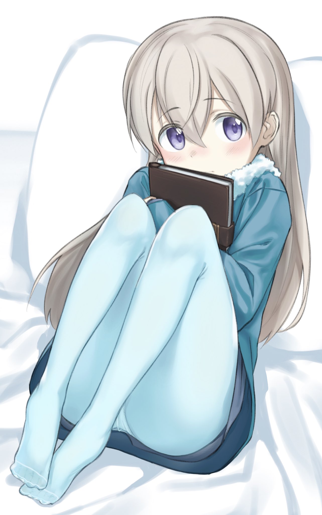 1girl blue_legwear blush curled_up eila_ilmatar_juutilainen english_commentary eyebrows_visible_through_hair fankupl highres lying notebook on_back pillow silver_hair solo strike_witches sweater violet_eyes world_witches_series younger