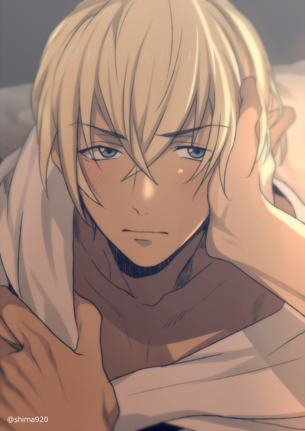 amuro_tooru bed_sheet blonde_hair blue_eyes blush closed_mouth commentary_request dark_skin dark_skinned_male eyebrows_visible_through_hair grey_background hair_between_eyes hand_on_another's_face looking_at_viewer male_focus mashima_shima meitantei_conan on_bed out_of_frame pov pov_hands sheet_grab solo_focus twitter_username yaoi