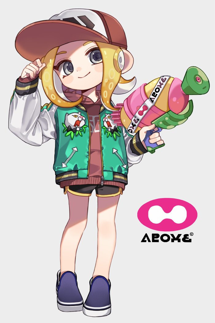 1girl animal_print baseball_cap black_shirt blonde_hair blue_footwear brown_headwear brown_shirt cat_print closed_mouth commentary dolphin_shorts green_jacket grey_eyes hat head_tilt holding holding_weapon hood hood_down hoodie inkling_(language) jacket letterman_jacket logo looking_at_viewer maco_spl makeup mascara medium_hair no_socks octoling open_clothes open_jacket shirt shoes short_shorts shorts smile solo splatoon_(series) splatoon_2 splattershot_(splatoon) standing suction_cups symbol_commentary tentacle_hair weapon