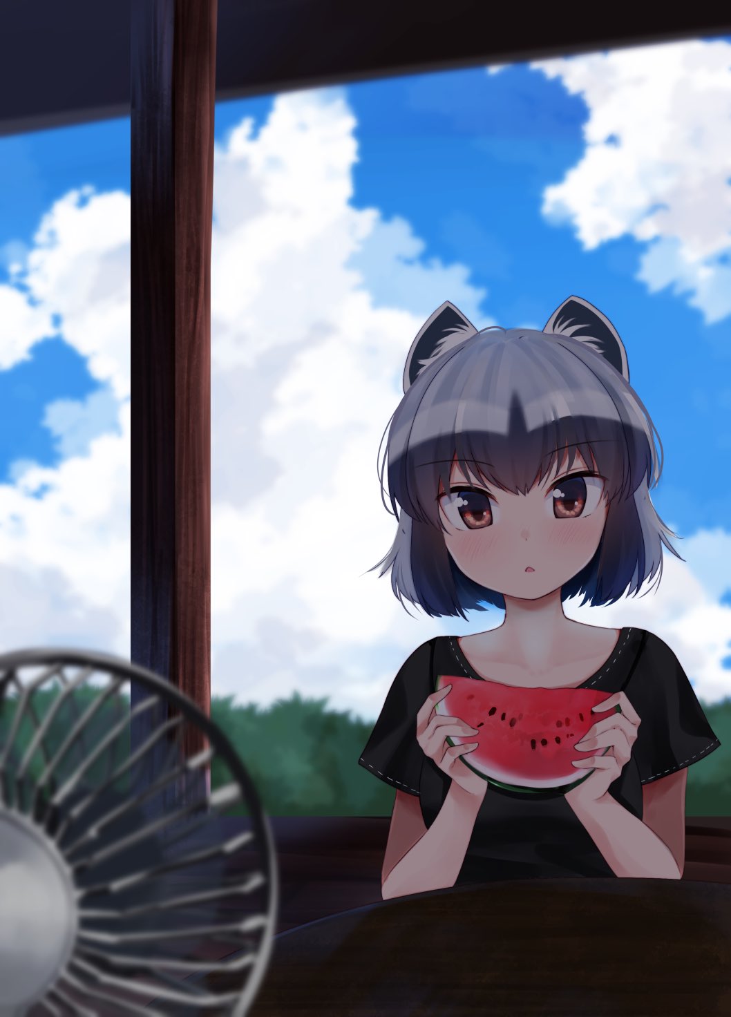 alternate_costume animal_ears black_shirt blue_hair blush casual collarbone commentary common_raccoon_(kemono_friends) electric_fan eyebrows_visible_through_hair food fruit grey_hair highres kemono_friends kinou_no_shika looking_at_viewer multicolored_hair orange_eyes raccoon_ears raccoon_girl shirt short_hair short_sleeves symbol_commentary t-shirt watermelon