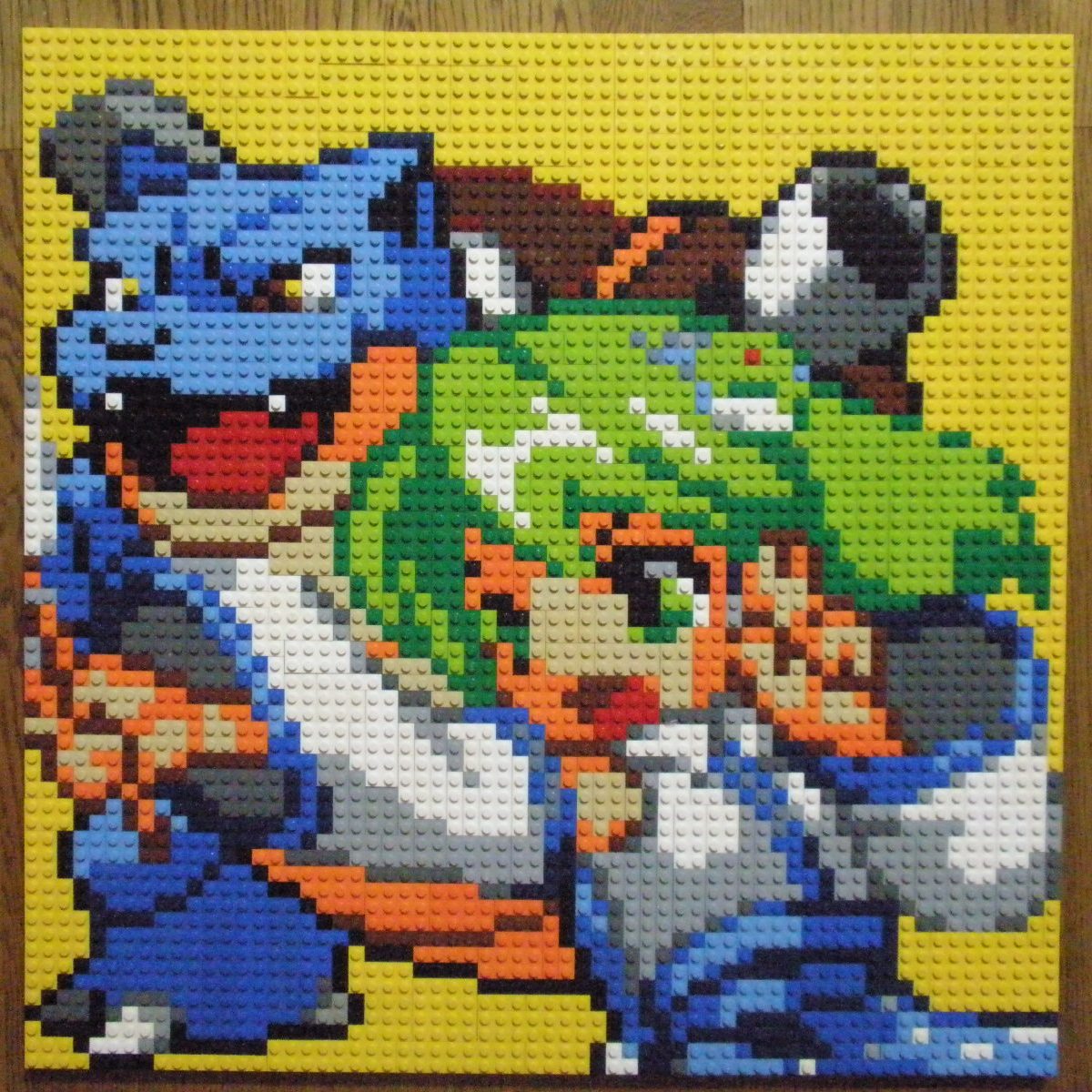 1girl blastoise blue_skirt detached_sleeves frog_hair_ornament gen_1_pokemon green_eyes green_hair hair_ornament highres japanese_clothes kochiya_sanae lego medium_hair miko open_mouth photo_(medium) pixel_art pokemon pokemon_(creature) shirt skirt starter_pokemon touhou unconventional_media upper_body v-shaped_eyebrows white_shirt wide_sleeves yellow_eyes you_rei_(blowback)