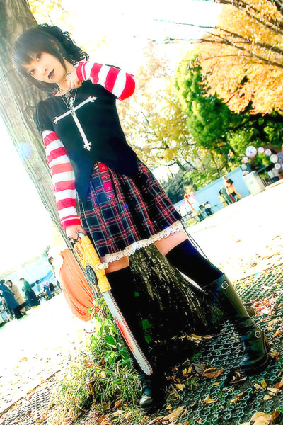 asian black_lagoon boots chainsaw cosplay female girl omi_gibson photo plaid pleated_skirt sawyer_the_cleaner striped thigh-highs women