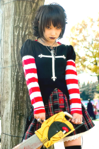 asian black_lagoon chainsaw cosplay female girl omi_gibson photo plaid pleated_skirt sawyer_the_cleaner striped thigh-highs women