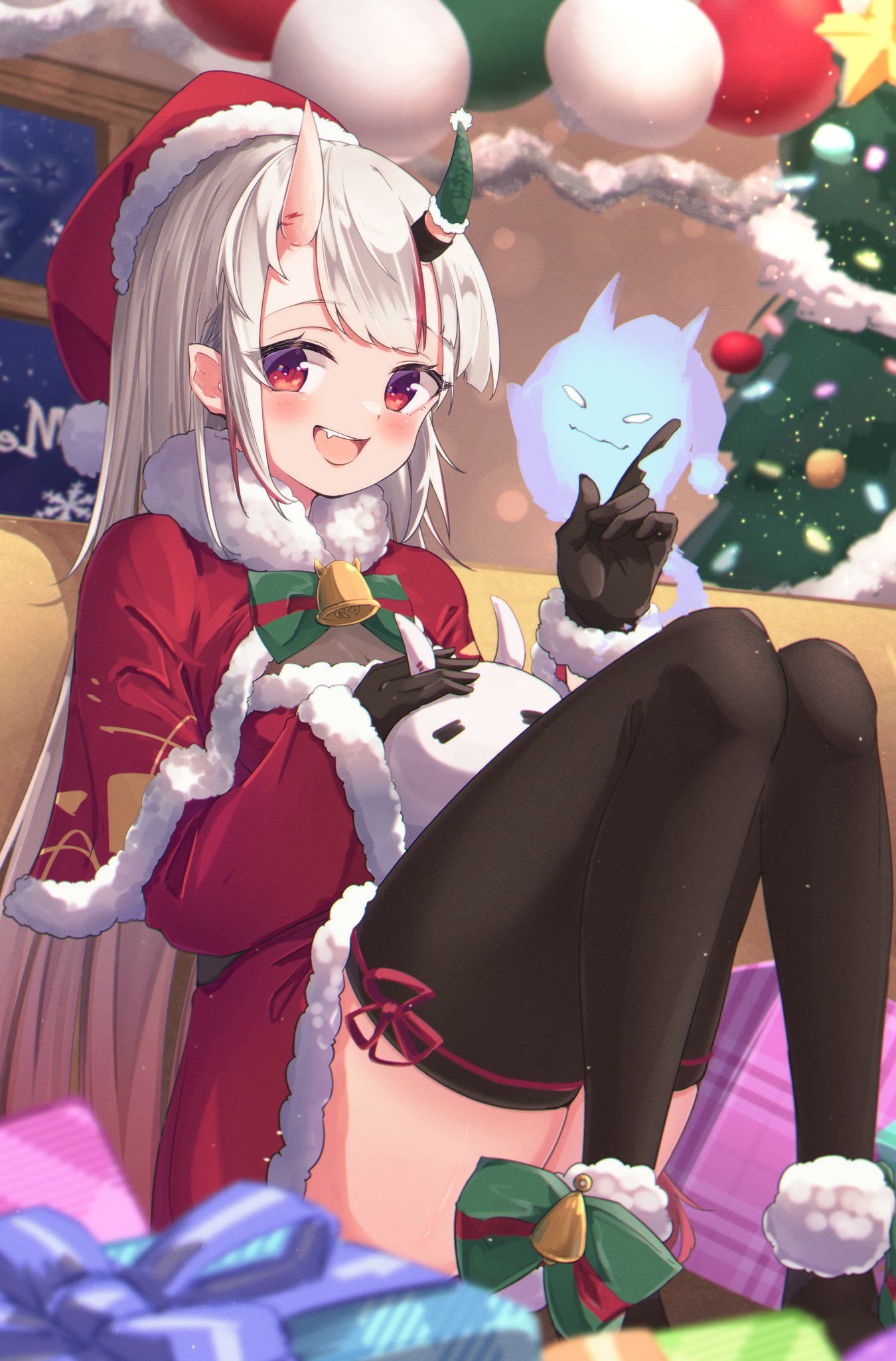 1girl :d bell black_gloves black_legwear blush bow bowtie capelet christmas christmas_ornaments christmas_tree commentary_request fang fur-trimmed_capelet fur-trimmed_sleeves fur_trim gift gloves hat highres hololive horns indoors long_hair looking_at_viewer merry_christmas multicolored_hair nakiri_ayame namaonpa night oni_horns open_mouth poyoyo_(nakiri_ayame) red_eyes redhead santa_costume santa_hat sitting smile streaked_hair thigh-highs virtual_youtuber white_hair